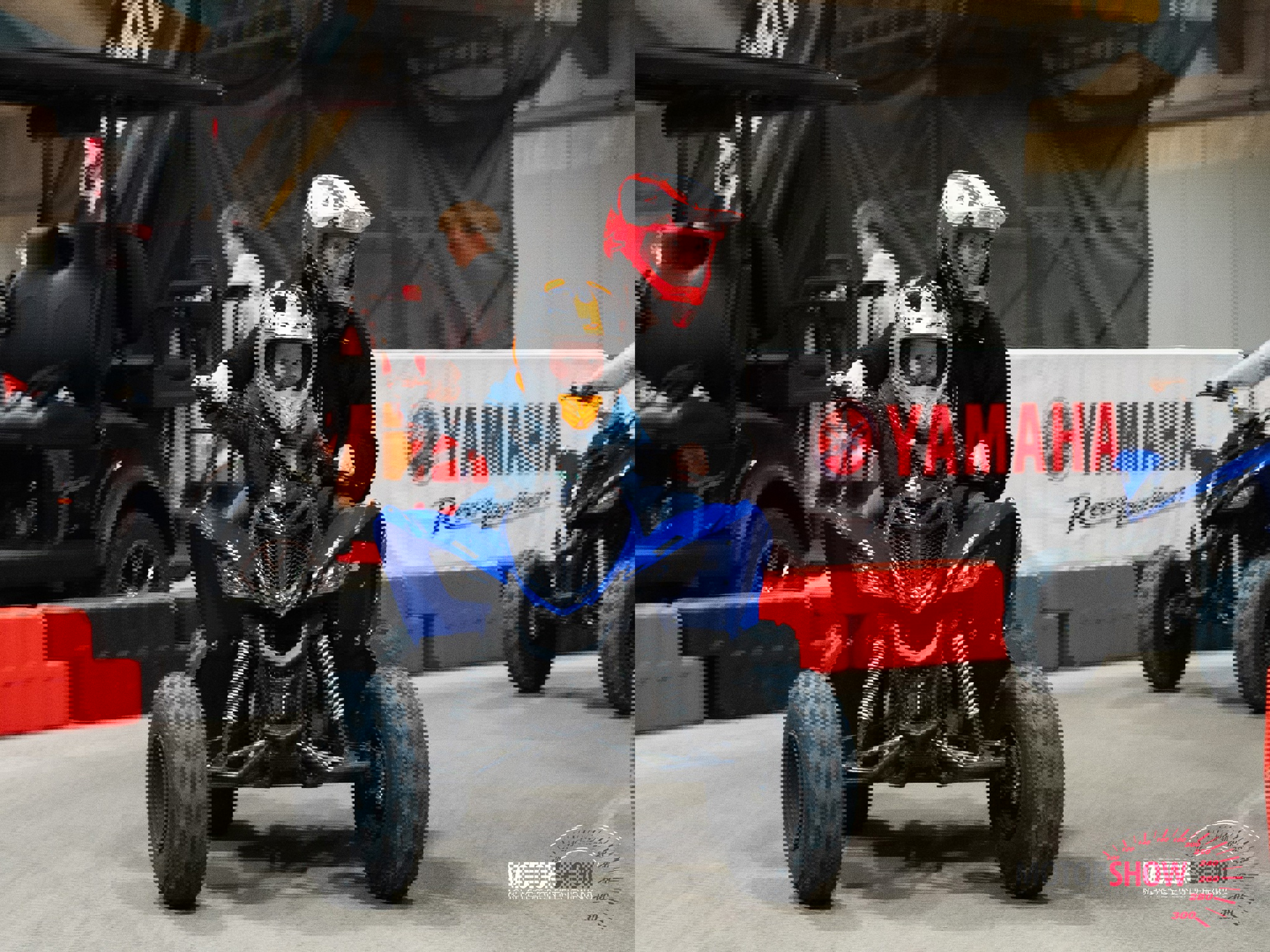 Voksen og barn på ATV til Motorshow Herning